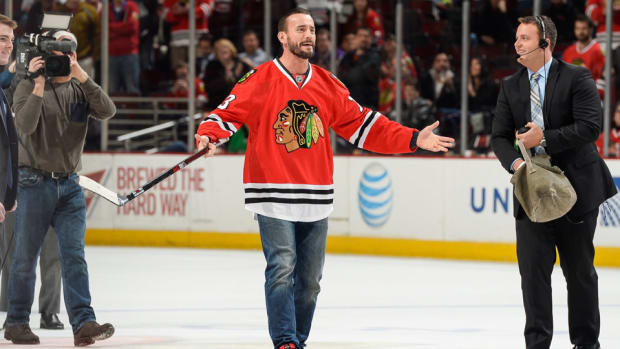 cm-punk-blackhawks-shoot-the-puck-nhl.jpg
